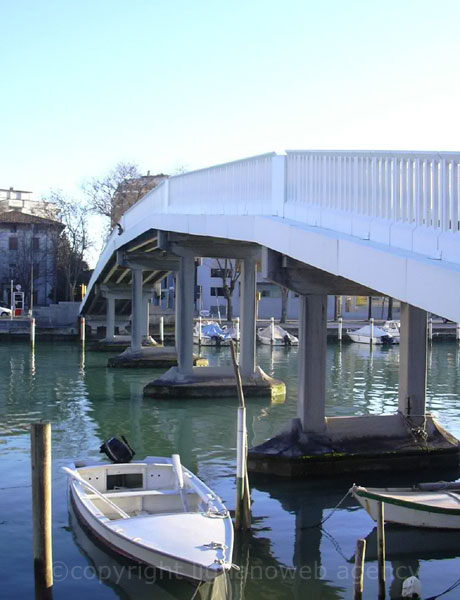 Bridge across the navigable channel Grado photo